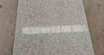 昭通芝麻白光面毛板