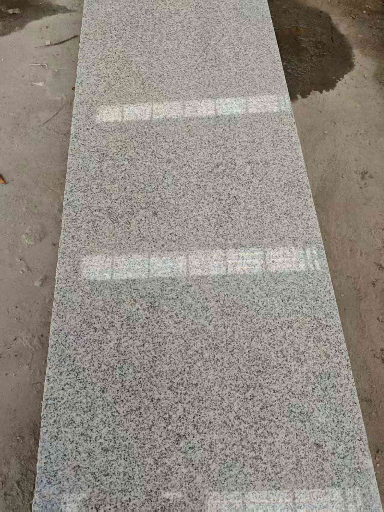 昭通芝麻白光面毛板